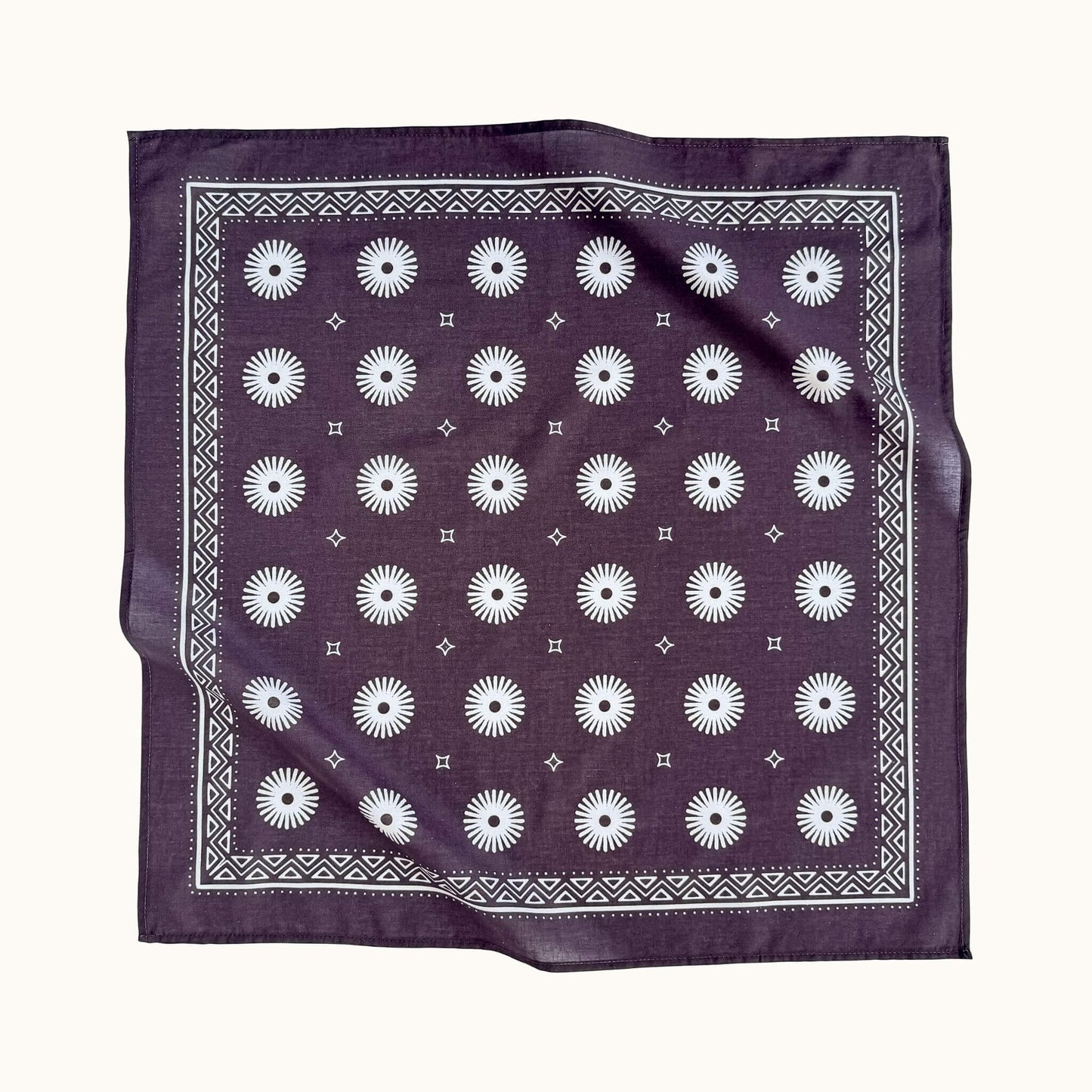 Western-style purple bandana with sunburst print