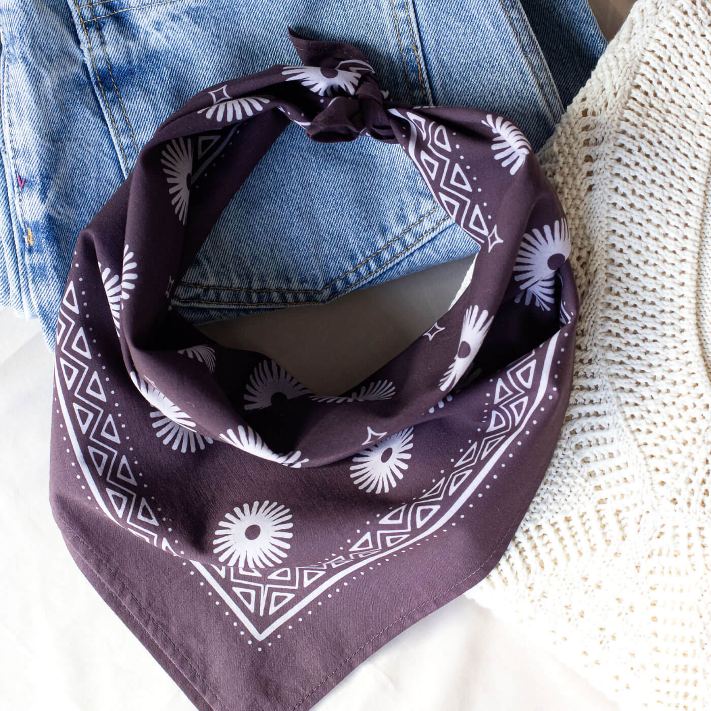 Purple bandana with white patterns 