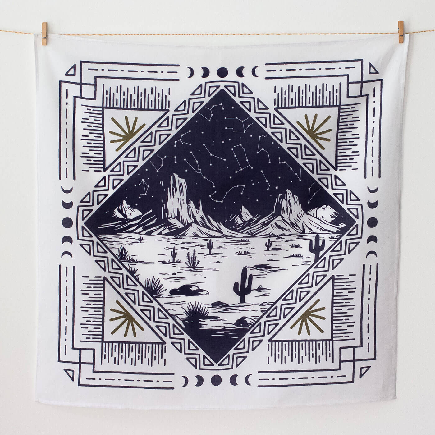 Bandana with desert landscape and geometric patterns on a white background