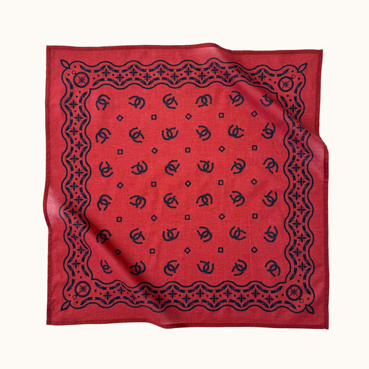 Red bandana with western-style black horseshoe pattern